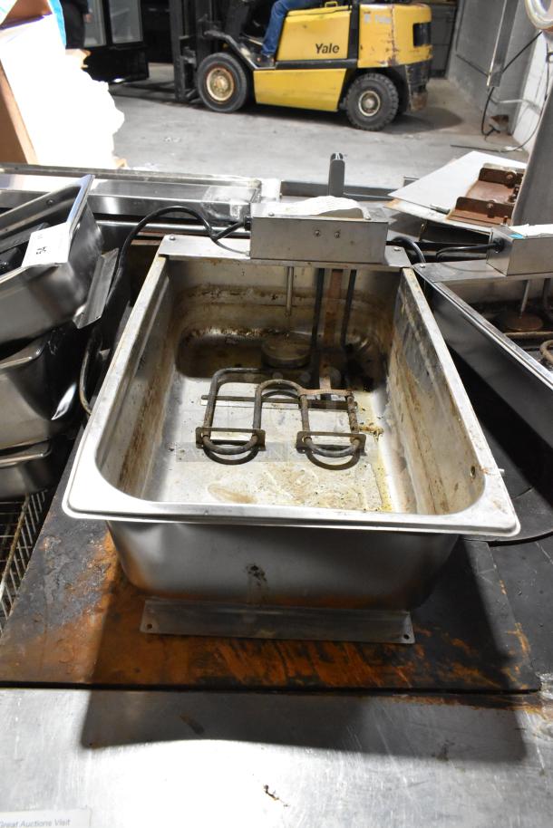 Continental F412502 metal evaporator tray, 120 volts, 1 phase, visible wear. Suitable for refrigeration systems.