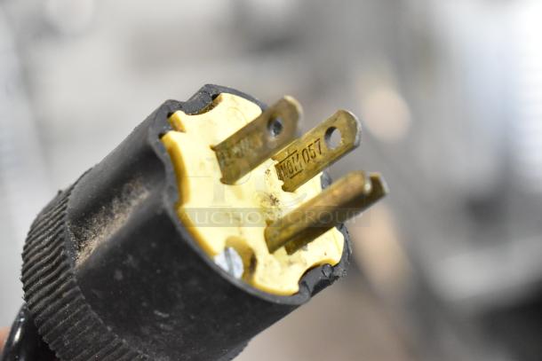 Berkel MB 7/16 metal bread slicer's power plug, showing a three-prong design, labeled 115V, 1 phase.