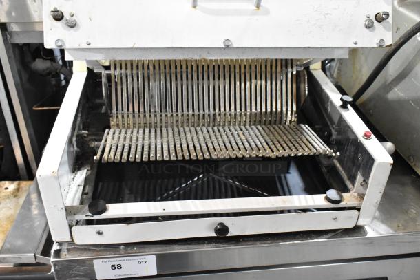 Berkel MB 7/16 metal commercial bread slicer, countertop model with blades visible. Used condition, 115V, 1 phase.