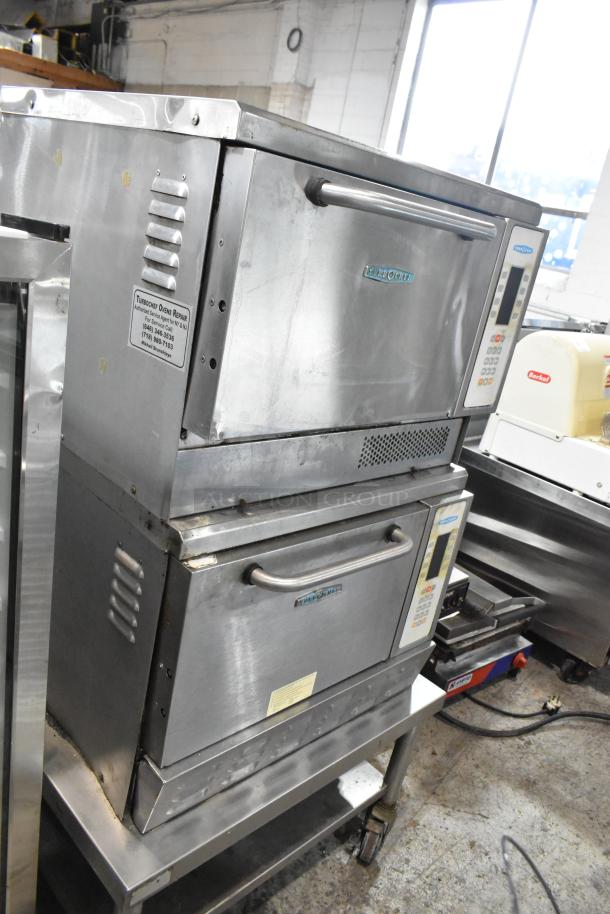 2 Turbochef NGC stainless steel rapid cook ovens on stand with casters, electric, 208/240V, 1 phase.