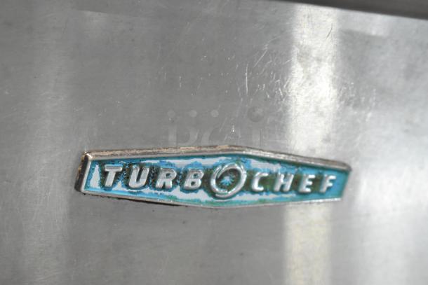 Turbochef NGC stainless steel logo on commercial rapid cook oven, electric-powered, mounted on equipment stand.