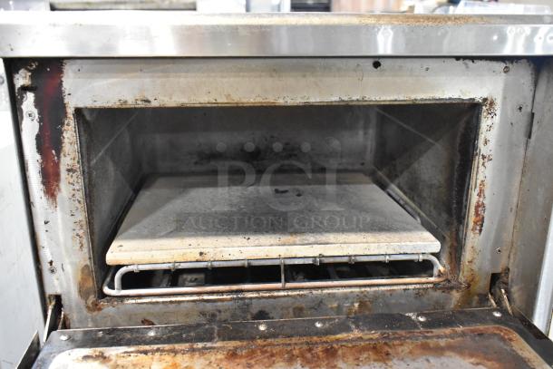 2 Turbochef NGC stainless steel rapid cook ovens on stand with casters, visible wear, 208/240V, 1 phase.