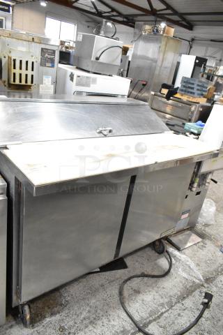 Beverage Air SPE48HC-12C stainless steel prep table with bain marie top, commercial casters, 115V, 1 phase, used condition.