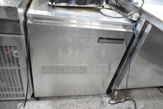 Delfield 406CA-DHL-DD1 stainless steel undercounter cooler, single door, commercial use, 115 volts, 1 phase, visible wear.