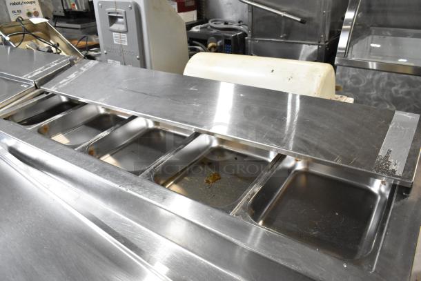 Randell 51395PR stainless steel pizza prep table with two drawers and doors, commercial casters, 115V, 1 phase.