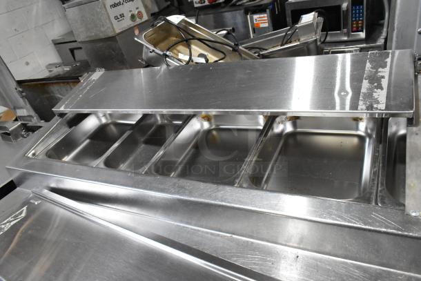 Randell 51395PR stainless steel pizza prep table with 2 drawers, doors, and commercial casters, 115V, 1 phase.