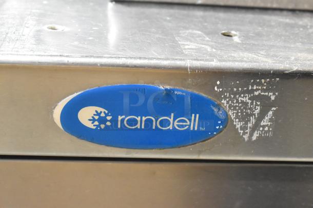 Randell 51395PR stainless steel pizza prep table with logo. Features 2 drawers, 2 doors, on casters. 115V, 1 phase.