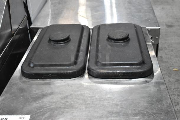 Taylor 432-27 stainless steel 2-flavor slushie machine, visible lids, used condition, 208-230 volts, 1 phase.