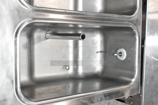 Taylor 432-27 stainless steel countertop slushie machine, dual flavor. 208-230V, 1 phase. Interior view.