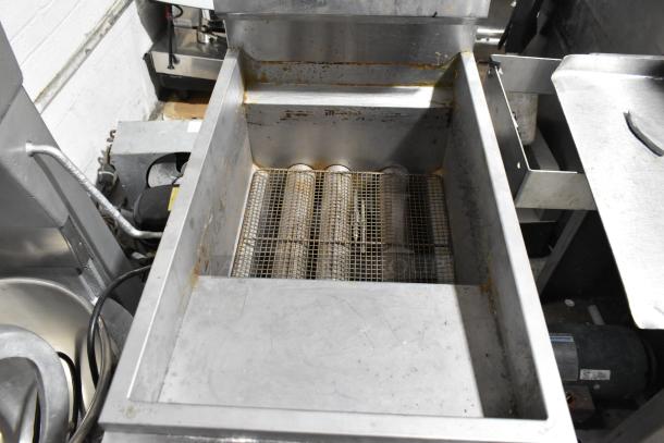 Cook Rite ATFS-40 stainless steel commercial gas fryer with two metal fry baskets. 102,000 BTU. Appears in used condition.
