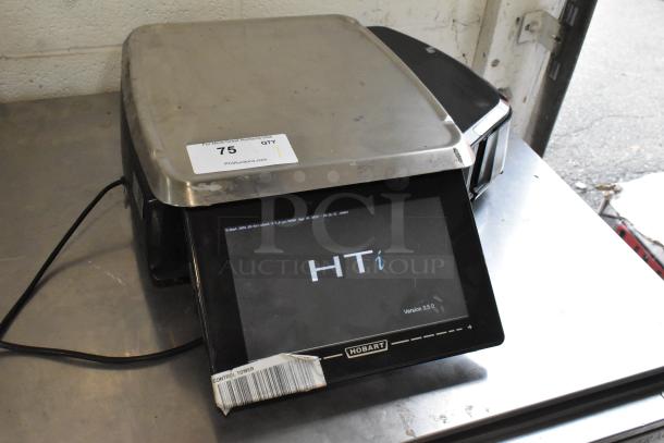 2016 Hobart HTi-7LH 30 lb. commercial scale with label printer; tested and working. Includes screen and barcode label.