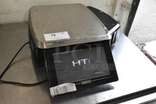 2016 Hobart HTi-7LH 30 lb. commercial scale with label printer; tested and working. Includes screen and barcode label.