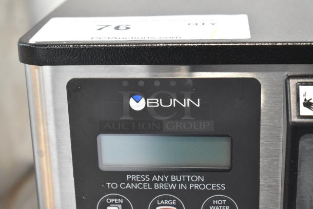 Bunn MyCafe stainless steel commercial espresso machine, digital display, 115 volts, 1 phase. Brand logo visible.