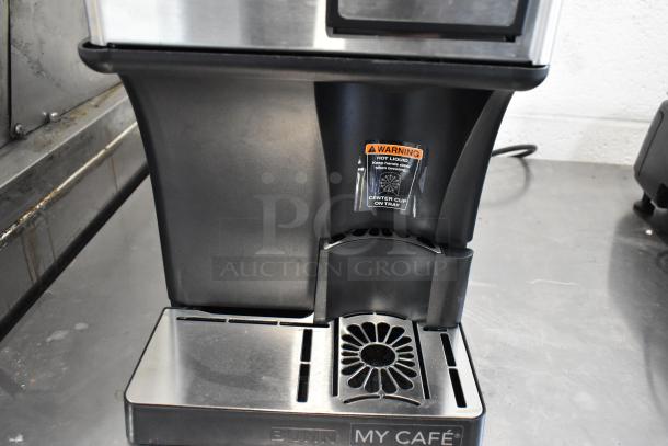 Bunn MyCafe stainless steel commercial espresso machine, 115 volts, with hot liquid warning label, in good condition.