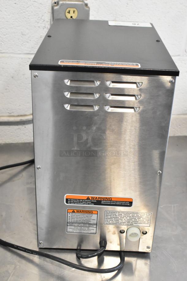 Bunn MyCafe stainless steel commercial espresso machine, countertop model, 115 volts, 1 phase, includes warning labels.