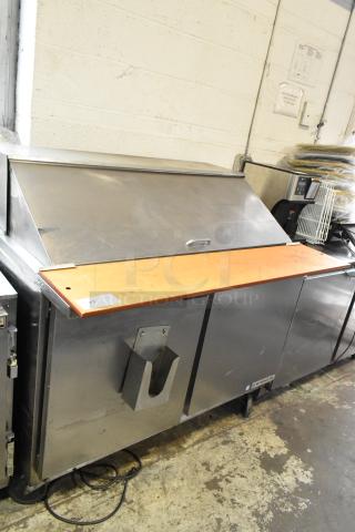 Beverage Air SPE48-18M stainless steel sandwich prep table with Bain Marie top, on casters, 115V, good condition.