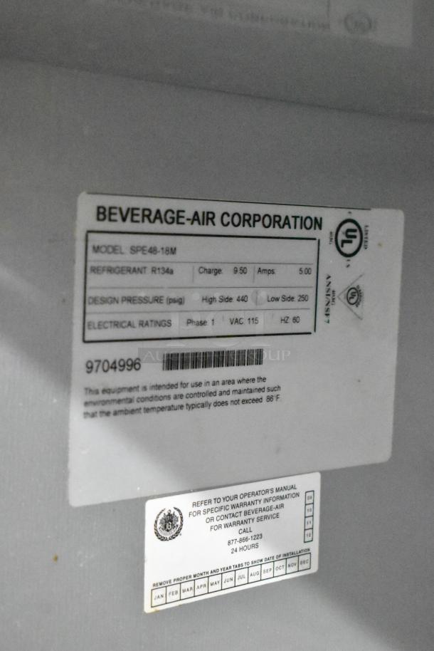 Beverage Air SPE48-18M stainless steel sandwich salad prep table tag, details model, refrigerant type, and electrical ratings.