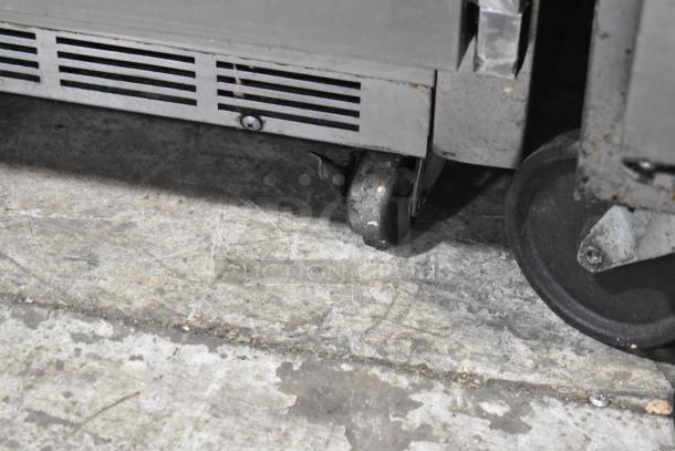 Beverage Air UCR48A stainless steel undercounter cooler on commercial casters, 115V, 1 phase, visible wear on casters.