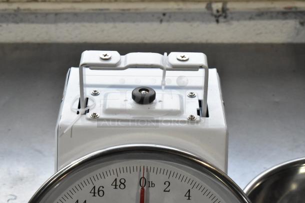 Galaxy metal countertop food portioning scale, white with a stainless steel tray, displays up to 48 lbs, used condition.