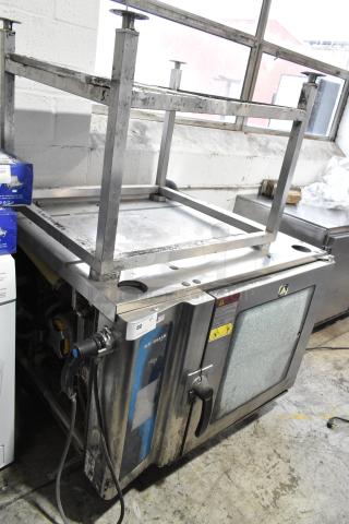 Alto Shaam 7.14 ESI stainless steel electric convection oven with equipment stand, visible broken glass, 208-240V, 3 phase.