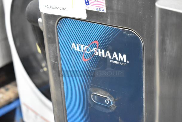 Alto Shaam 7.14 ESI stainless steel combi oven, electric, with equipment stand, visible damage to glass, 208-240V, 3 phase.