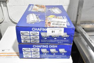 Brand new metal chafing dishes, scratch and dent condition, in original packaging, includes steam and water pan, and two fuel holders.