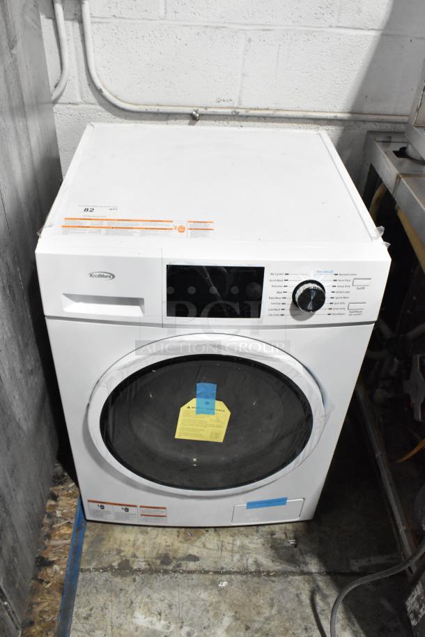 Brand new KoolMore front load washer, metal finish, visible scratch and dent, digital display, factory label attached.