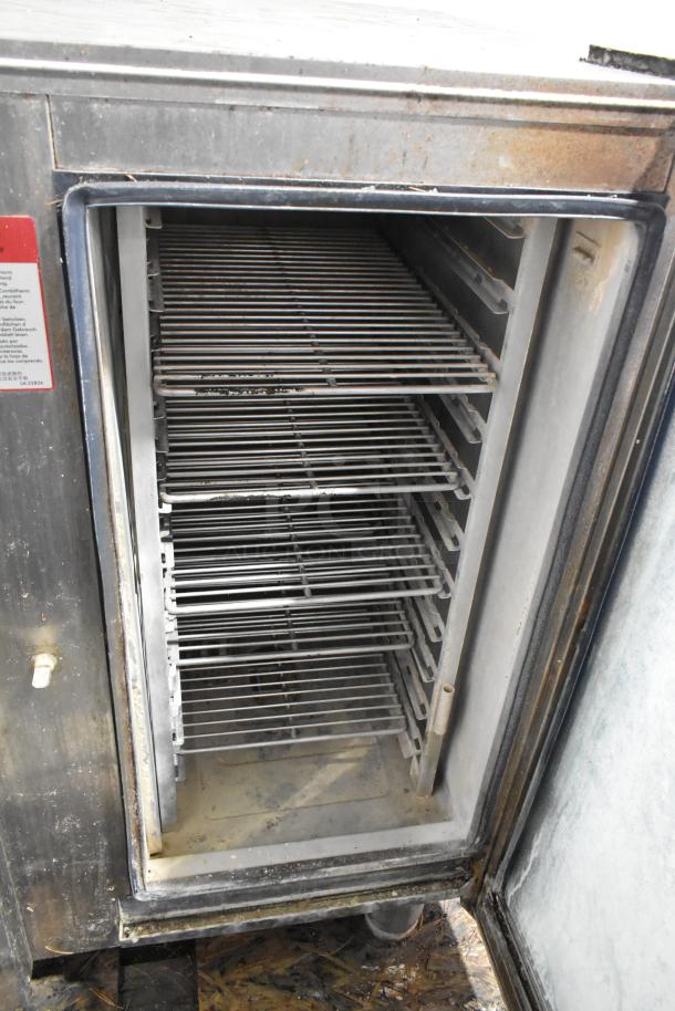 Alto Shaam CTP18-10E stainless steel combi convection oven, open door, visible racks, used condition, electric, 208-240V, 1 phase.