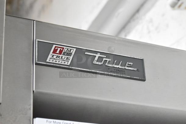 2017 True T-19F stainless steel commercial single door reach-in freezer, featuring True logo on exterior.