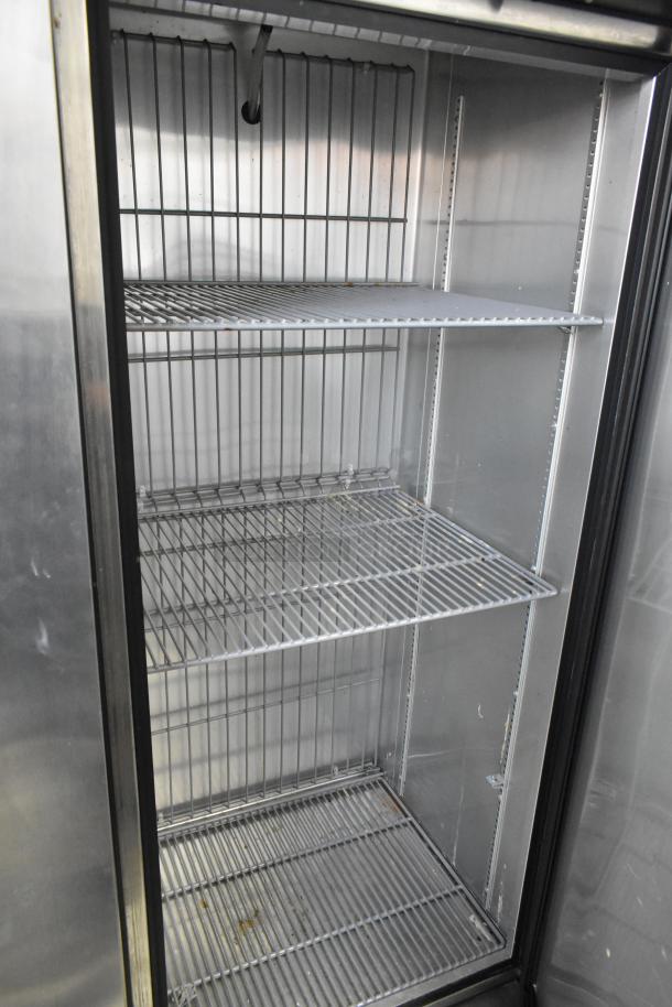 2017 True T-19F stainless steel single door freezer with poly coated racks, commercial grade, 115V, used condition.