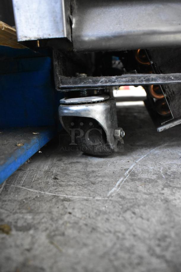 2017 True T-19F stainless steel single door freezer on sturdy commercial casters, 115V, 1 phase. Poly coated racks.