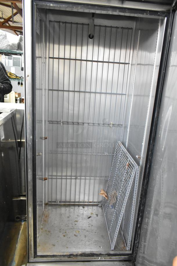 2017 True T-19F stainless steel commercial freezer with poly-coated racks, single door, on casters. 115V, 1 phase.