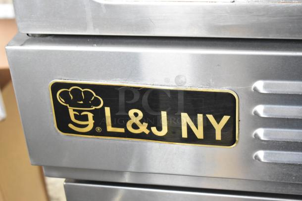 L&J NY stainless steel convection oven label, features thermostatic controls, view-through doors, on commercial casters.