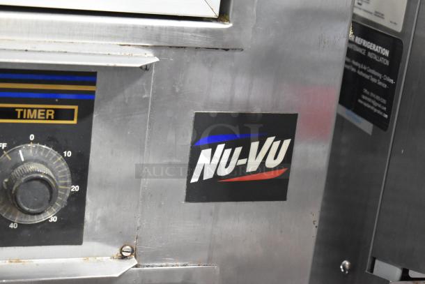 Nu Vu SUB-123 stainless steel oven proofer, missing lower door, on casters, 240V, 3-phase. Visible Nu Vu logo.