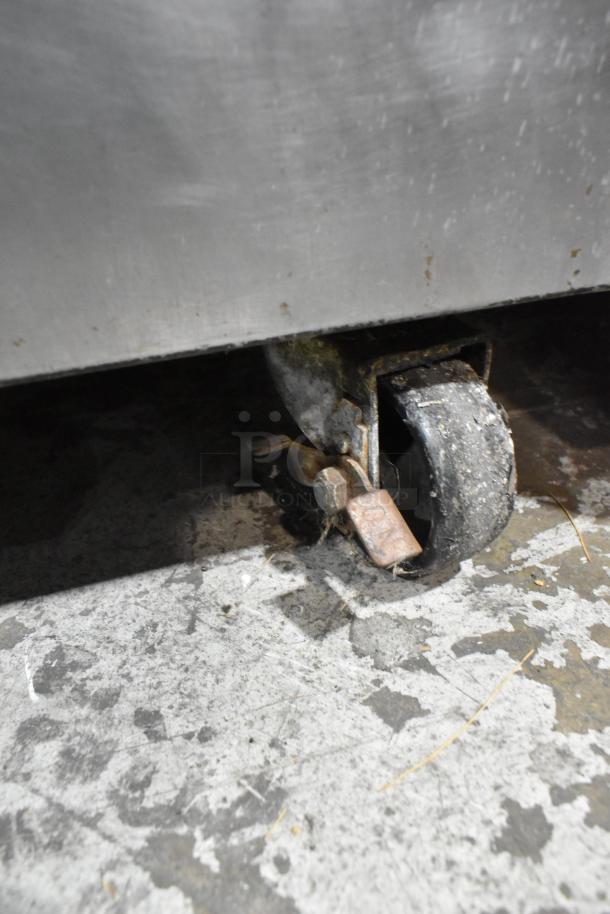 Nu Vu SUB-123 stainless steel commercial oven proofer on casters; missing lower door; 240V, 3-phase; minor wear evident.