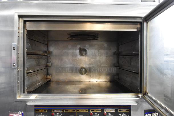 Nu Vu SUB-123 stainless steel commercial oven proofer, missing lower door, on casters, 240V, 3-phase, clean interior.