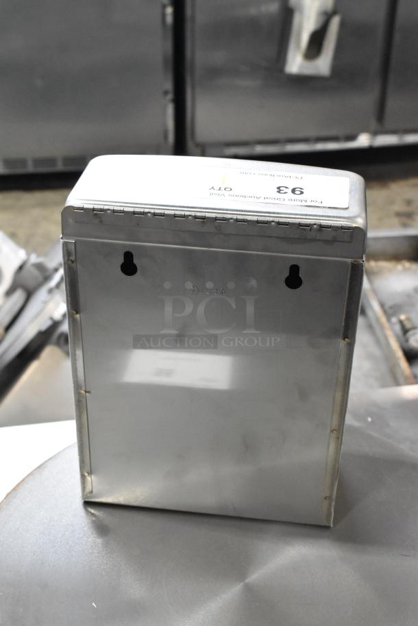 Bobrick stainless steel trash can, silver finish, wall-mountable, slight surface wear, visible mounting holes, labeled "93."