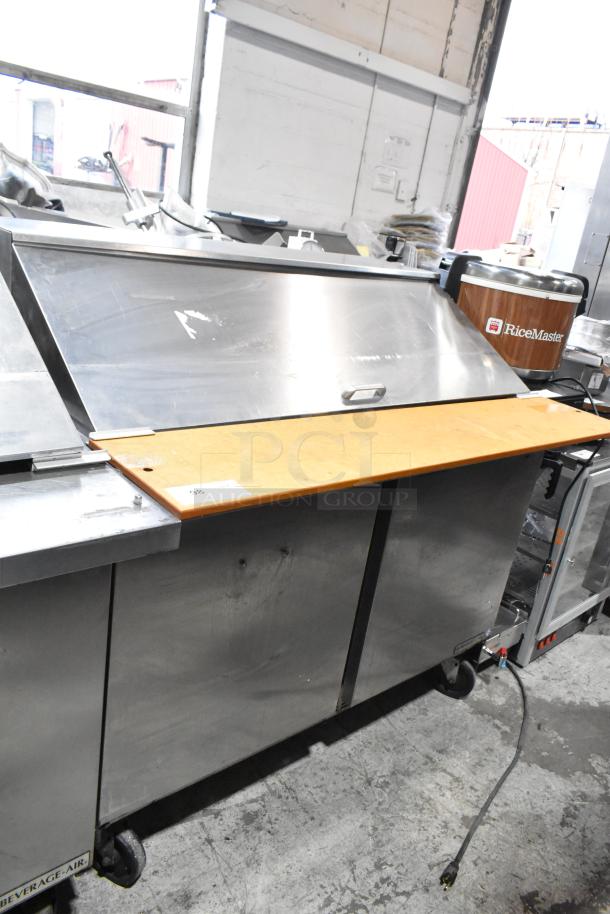 Beverage Air SPE48-18M stainless steel prep table on casters, ideal for sandwiches and salads, 115V, good condition.