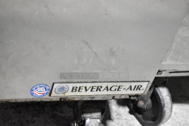 Beverage Air SPE48-18M-HMP stainless steel commercial prep table, visible logo, and "Made in USA" label.