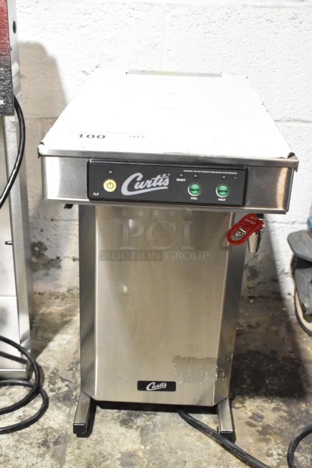Curtis TLP12A19 stainless steel coffee machine, hot water dispenser, 120V. Features brand logo, power controls, and red label tap.