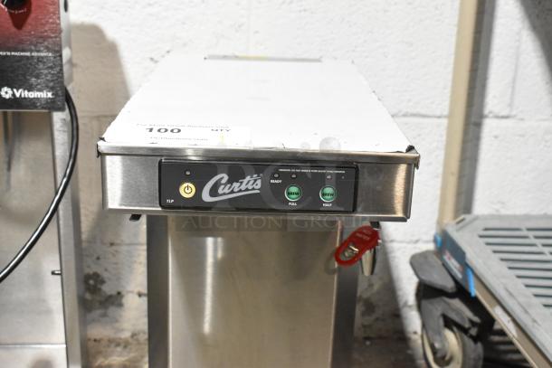 Curtis TLP12A19 stainless steel commercial coffee machine with hot water dispenser, 120V, countertop model, shown with front control panel and brand logo.