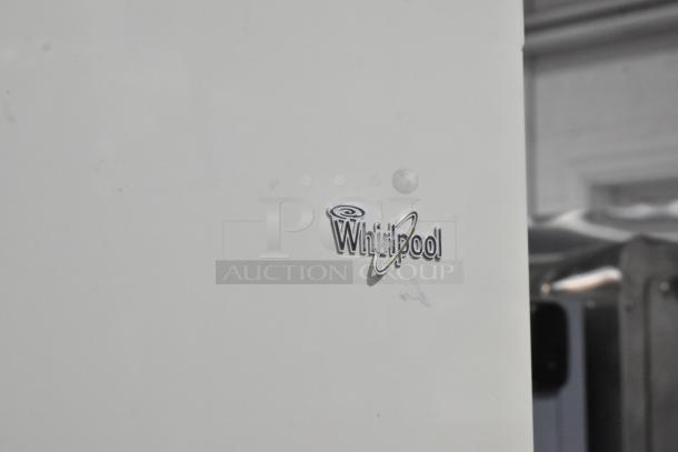 Whirlpool WRT511SZDW00 reach-in cooler and freezer, white exterior, visible Whirlpool logo, 115 volts, 1 phase.