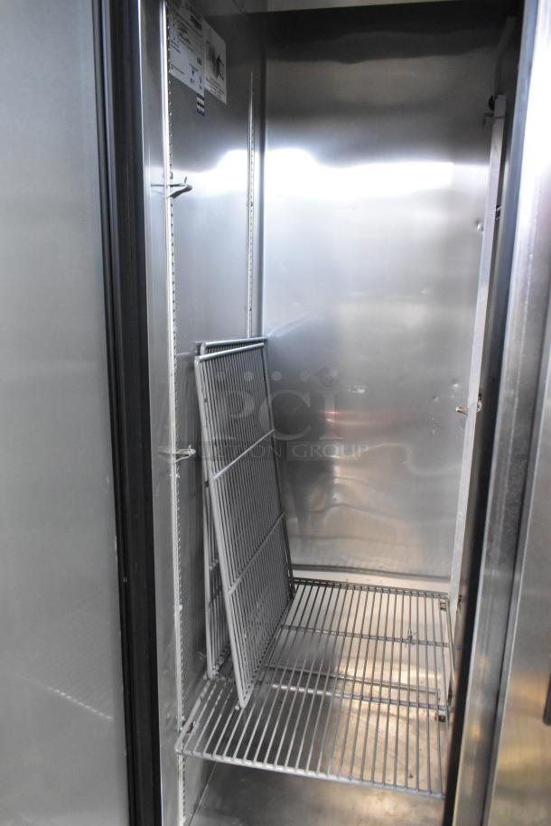 2017 True T-35 stainless steel commercial 2 door cooler, poly racks, commercial casters, 115 volts, 1 phase, model T-35.