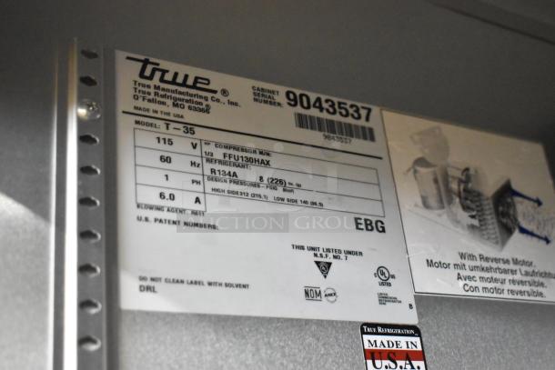 2017 True T-35 stainless steel commercial cooler label, model details, 115V, 1 phase, compressor info, Made in USA.