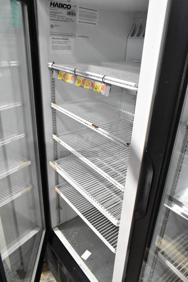 Habco SE12 metal commercial cooler, single door, poly-coated racks, 115 volts, 1 phase. Interior label visible.