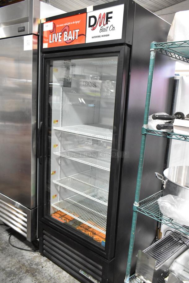 2021 True GDM-26-HC commercial cooler with single glass door, poly-coated racks, 115 volts, 1 phase. “Live Bait” sign on top.