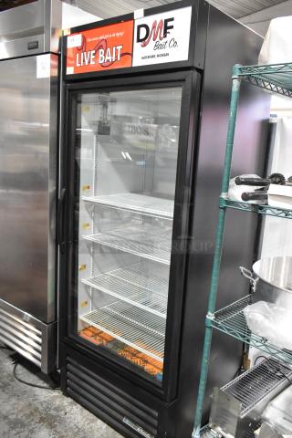 2021 True GDM-26-HC commercial cooler with single glass door, poly-coated racks, 115 volts, 1 phase. “Live Bait” sign on top.