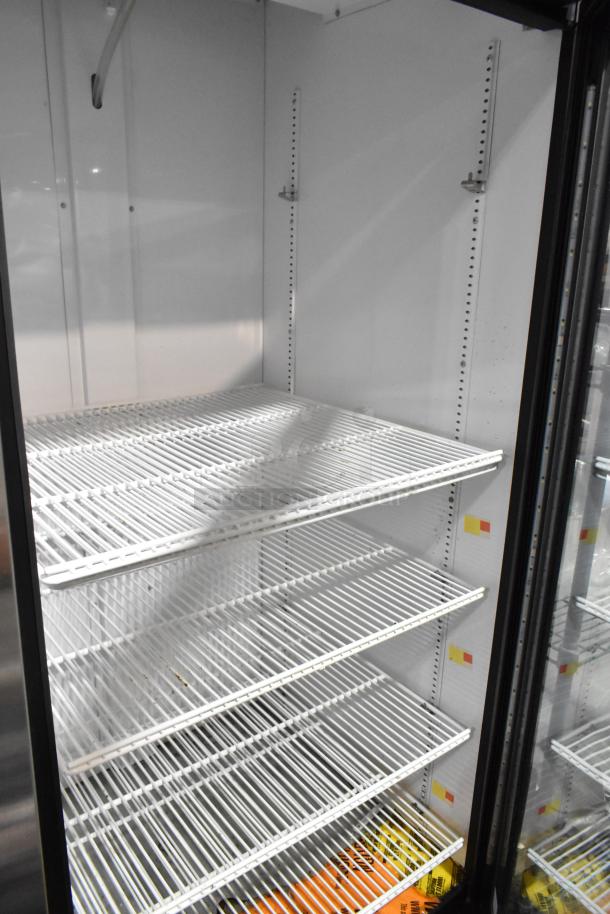 2021 True GDM-26-HC Reach-In Cooler, single door, poly-coated racks, excellent condition, 115V, 1 phase.