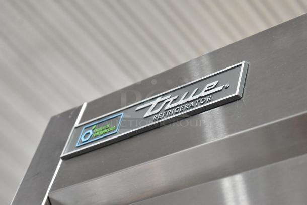 2024 True T-23-HC stainless steel commercial single door cooler, poly-coated racks, commercial casters, 115V, 1 phase.