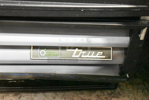 2017 True GDM-12-HC-LD cooler merchandiser, single door, metal, poly coated racks, natural refrigerant label.